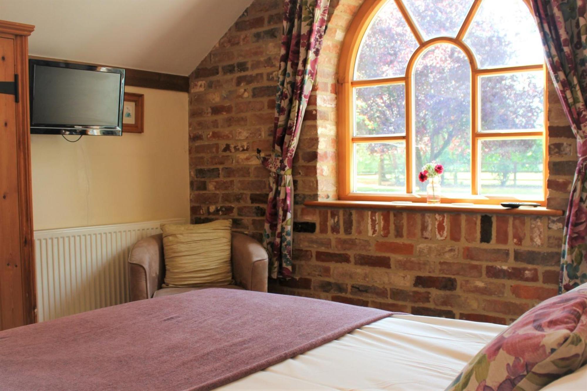 Bed and Breakfast Woodman'S Farm Stratton Strawless Номер фото